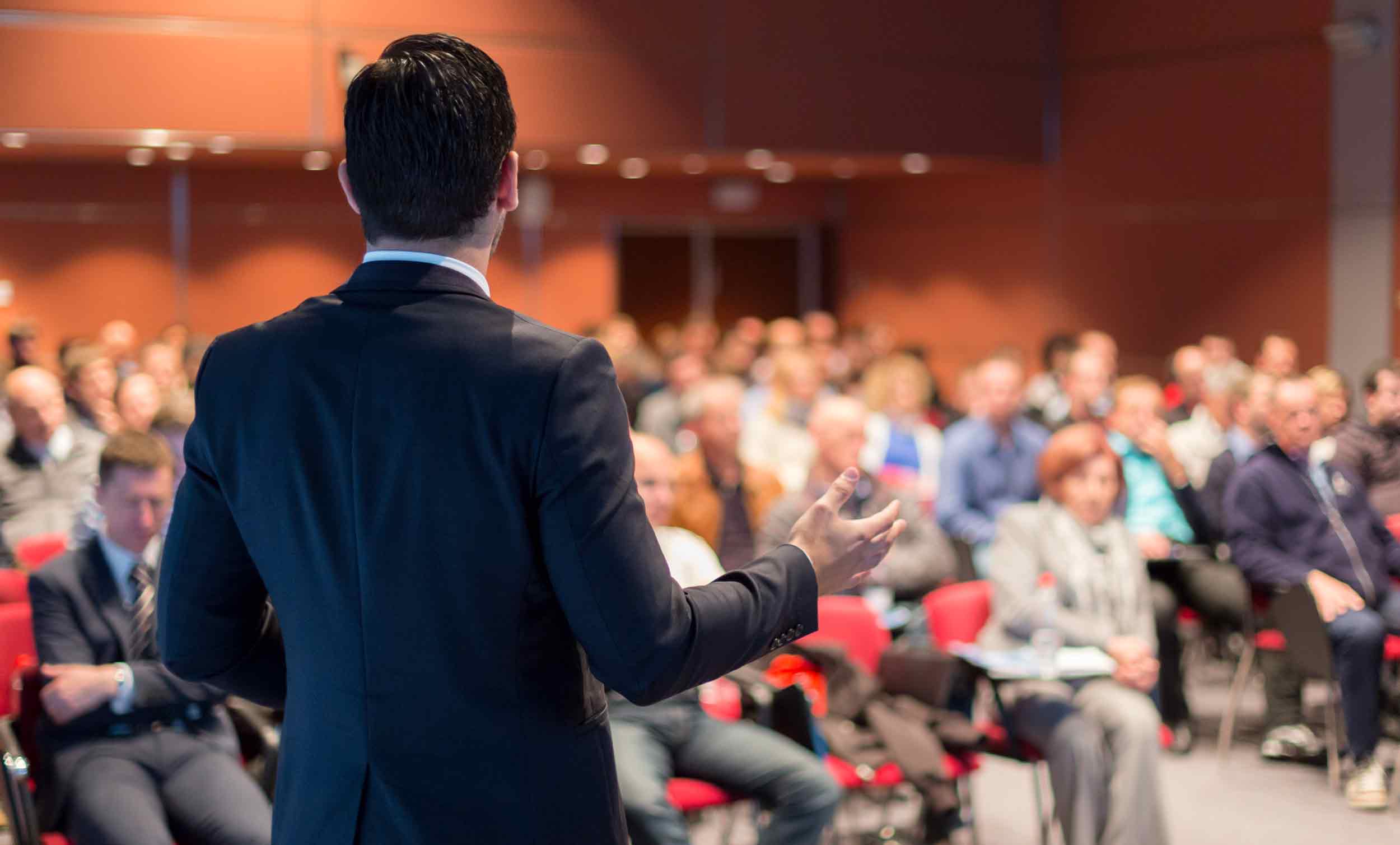 Speaker,Giving,A,Talk,On,Corporate,Business,Conference.,Unrecognizable,People